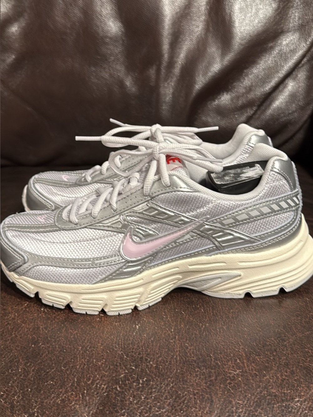 Nike Women’s Silver Running Sneakers
Brand New without box. Never been used!
